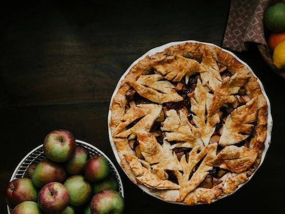 An apple pie with a decorative top
